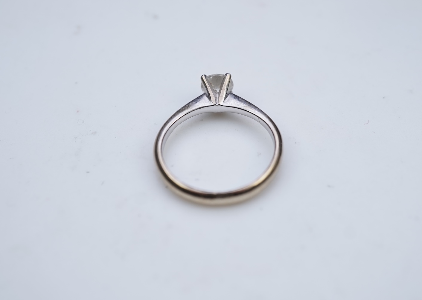 A diamond solitaire ring